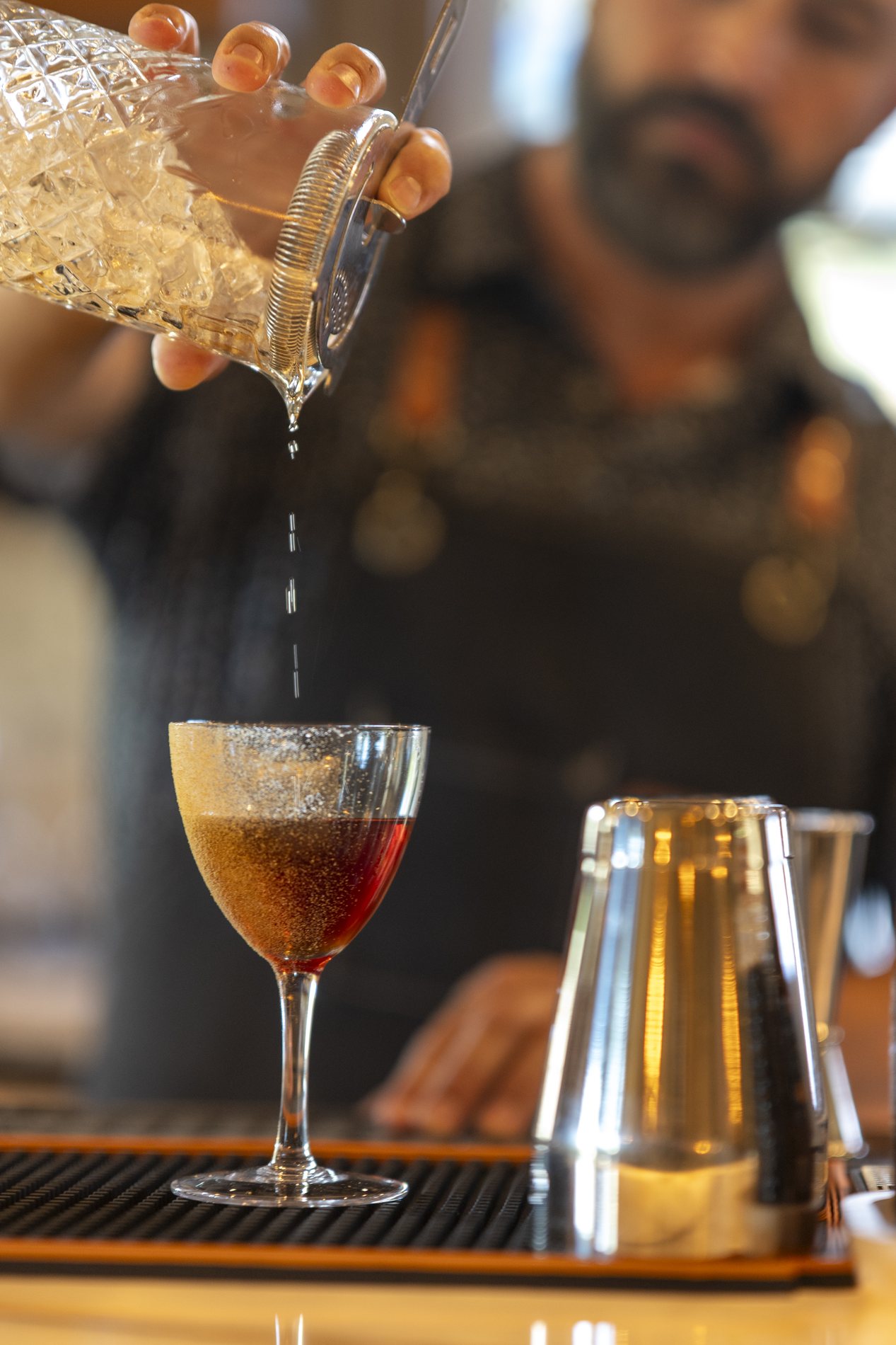 A cocktail poured at Oakhouse