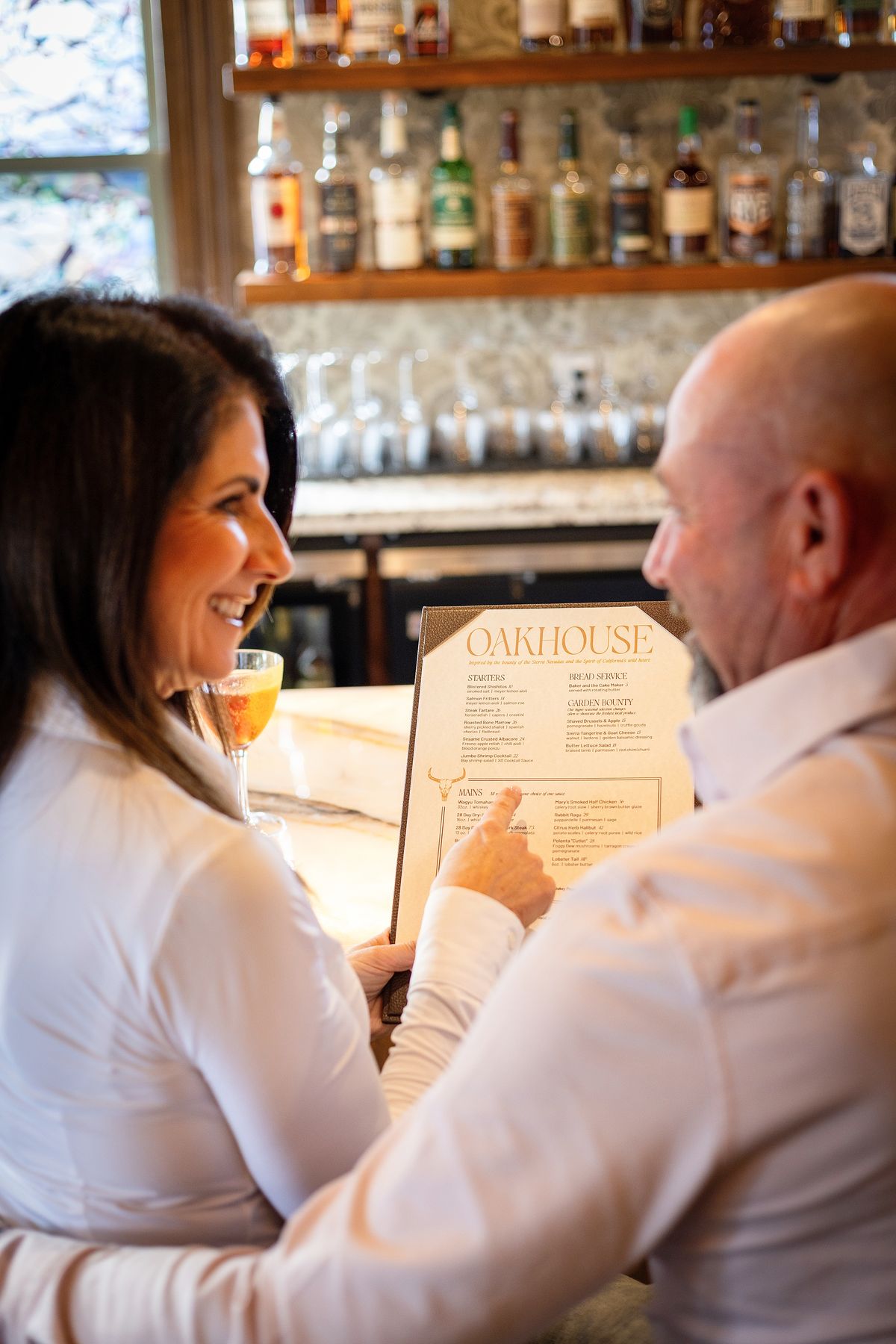 Reading the menu at Oakhouse